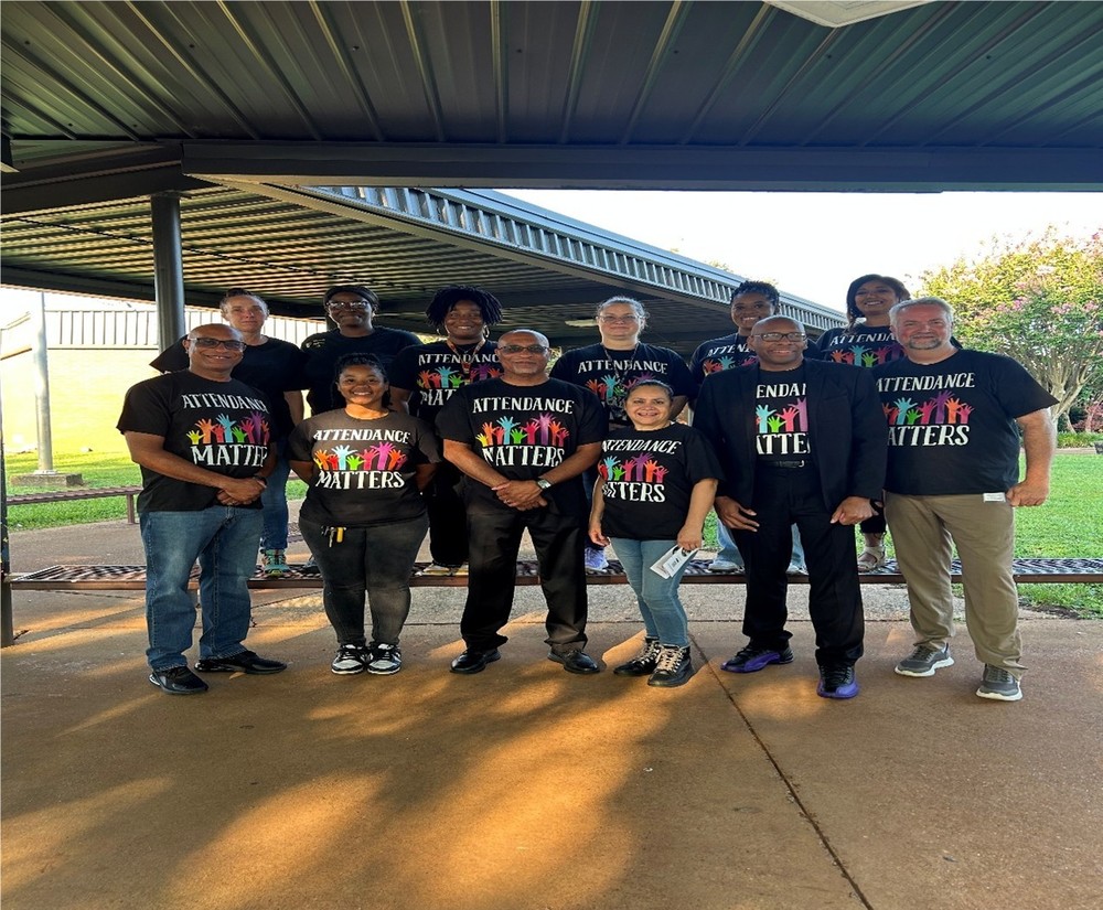 Picture of faculty wearing Attendance Matters shirts