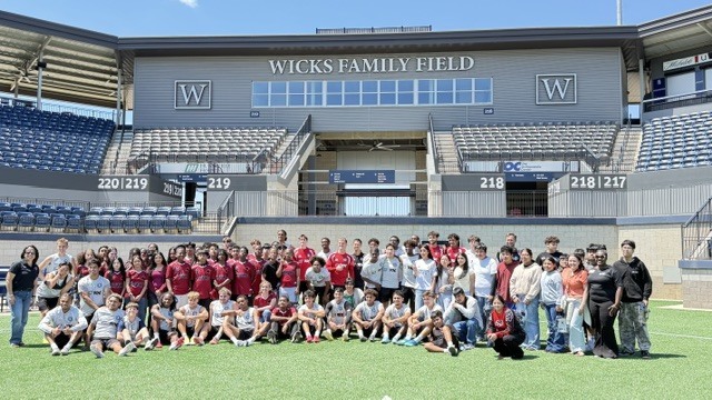 The WMS soccer team with the Huntsville City FC team at Joe Davis Stadium.