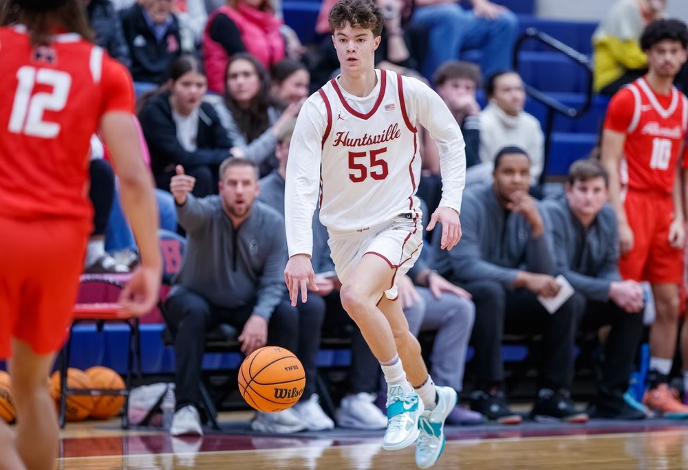 Sophomore Graham Gossett dribbles the ball up the court. 