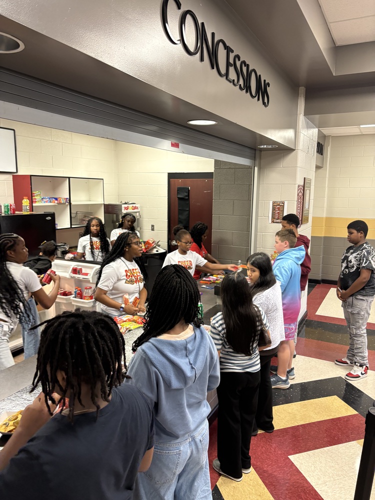 7th-grade students at the concession stand during Hawk Period.
