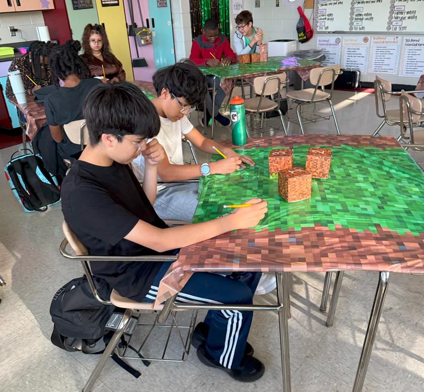 Students participating in an English activity where they unlocked memories for their personal narrative topics. 