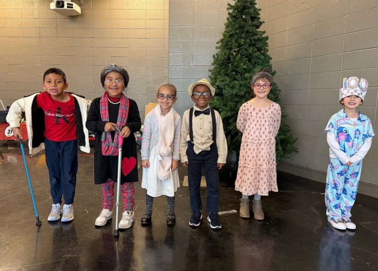 kindergarten and first grade students dressed up as old people for the 100th day of school.