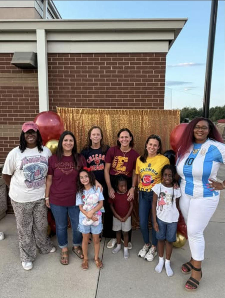 Morris Elementary teachers and students posing for a picture at the Columbia tailgate