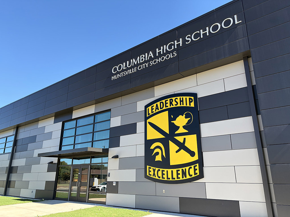 View of the new Columbia JROTC building, with the Leadership and Excellence JROTC Logo on the building facade