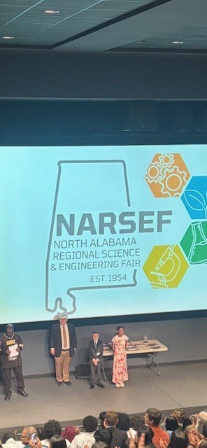 Two WMS students getting their award for placing second at the regional science fair.