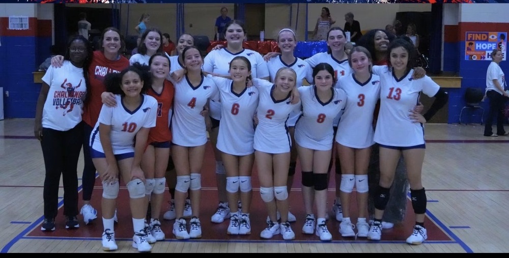 A picture of the team and coaches.