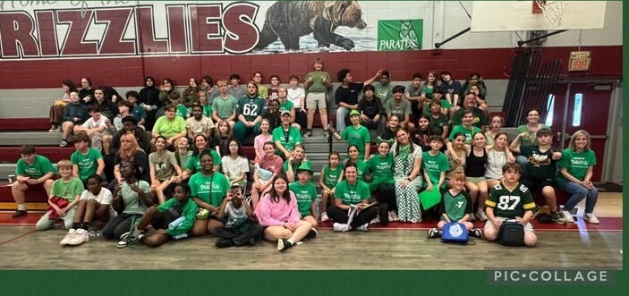 a group picture of green house as the winning house for the whole school year
