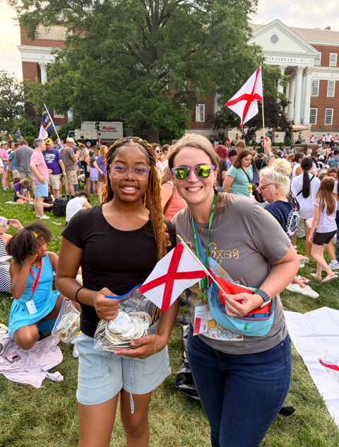 Mrs. Carter and Angelice in front of a crowd at National History Day in Washington DC.