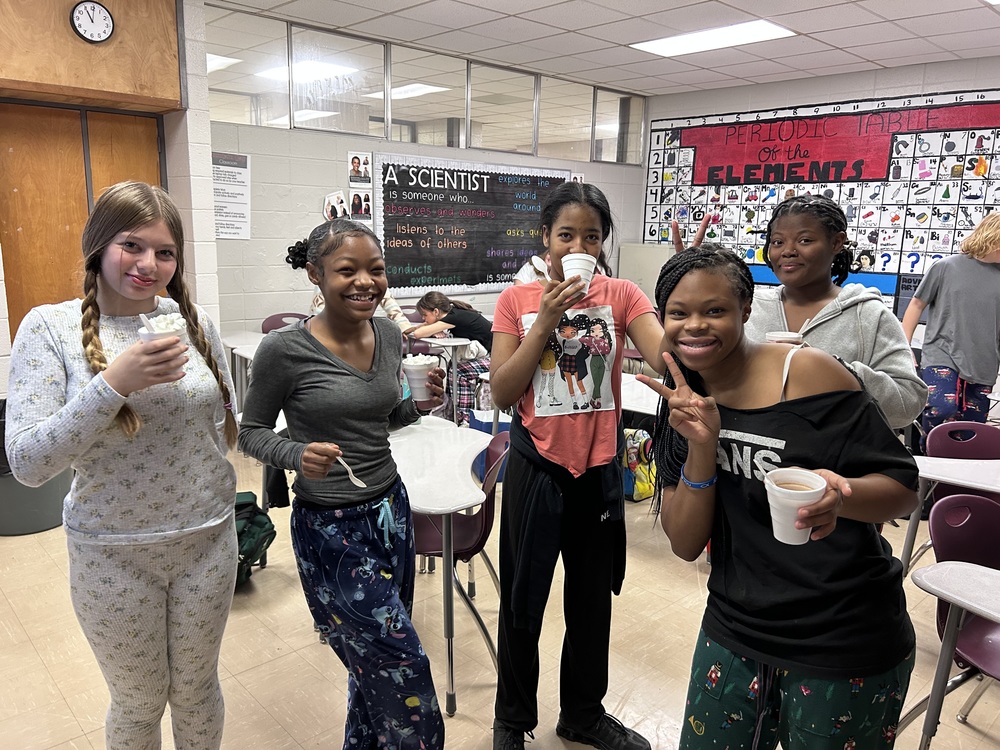 Students enjoying their hot chocolate in science class