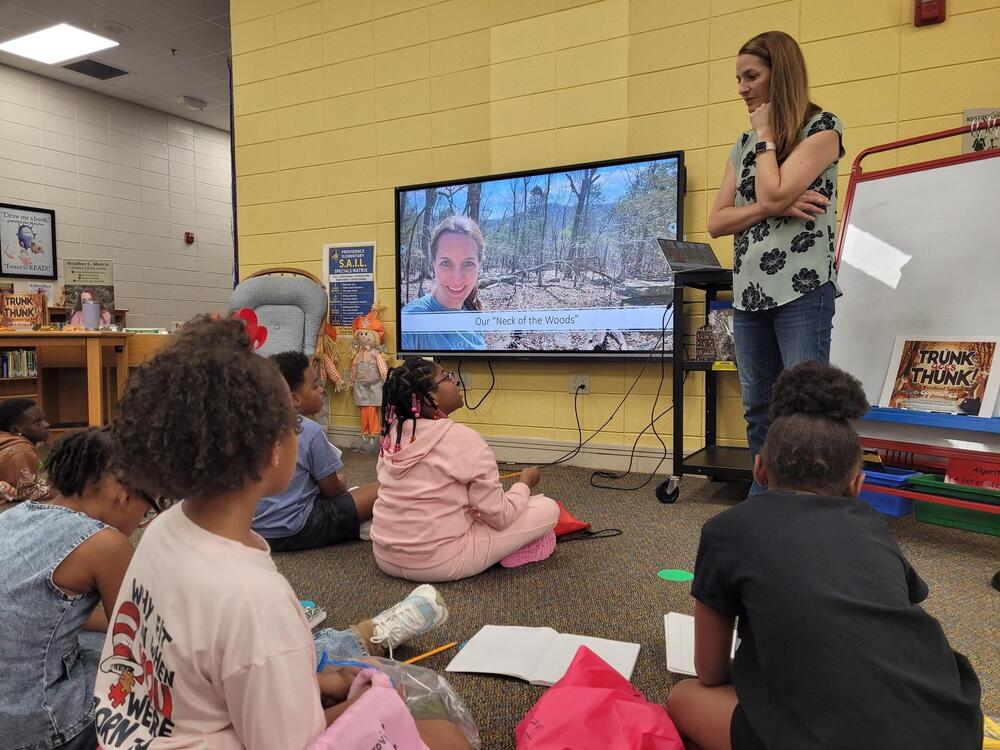 Students listening to author