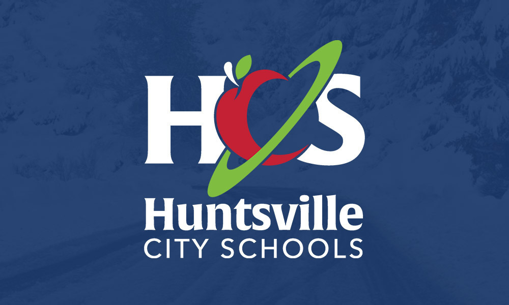 HCS logo overlaying an blue tinted winter weather scene
