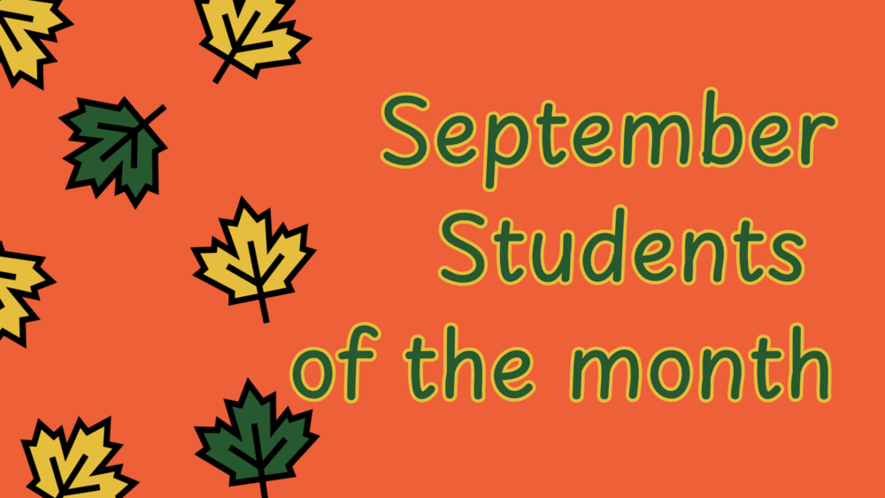 September Students of the Month surrounded by fall leaves