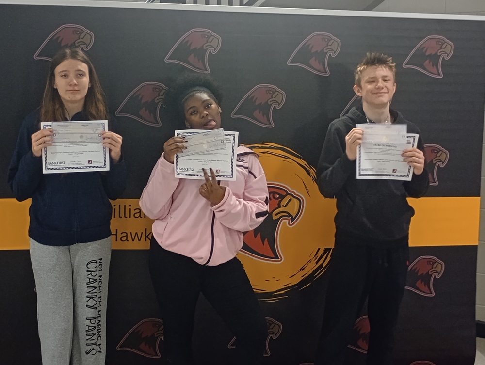 Rose Stephens, Jordan Johnson, and Ryllan Randolph are the 2026 Personal Finance Middle School State Champions.