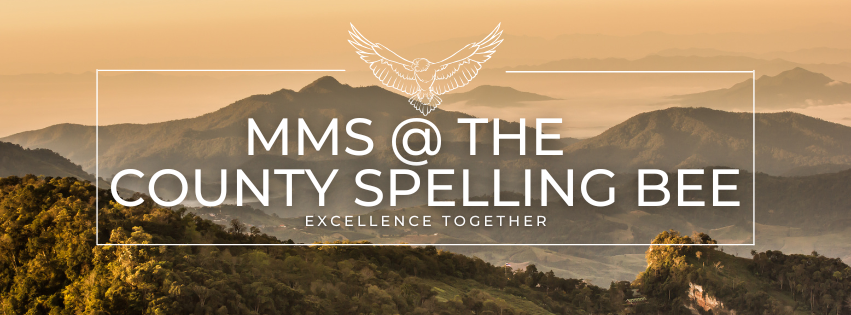 beige and green mountains in the distance with the words "MMS @ the County Spelling Bee " and "Excellence together" surrounded by a thin while rectangle and an eagle at the top. 