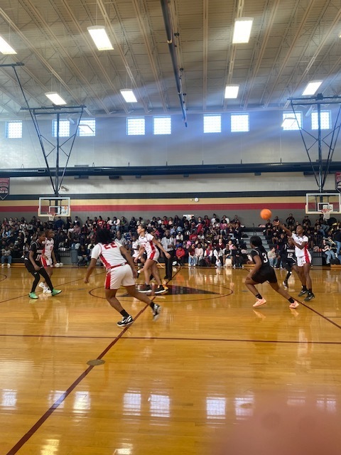 Williams Middle School girls basketball team playing against Morris Middle School during the basketball bird bowl game.