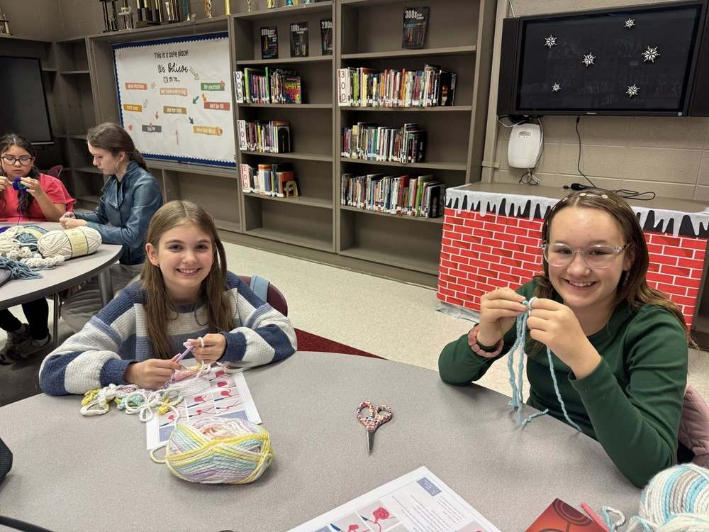 two students in crochet and knitting club
