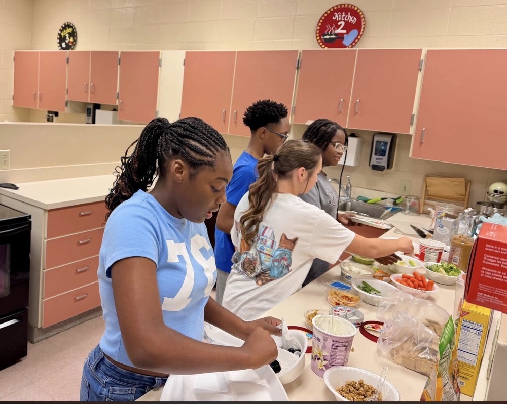 students making their healthy snack options.