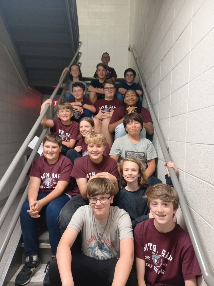 The MGMS Academic Team Group Picture on a Staircase