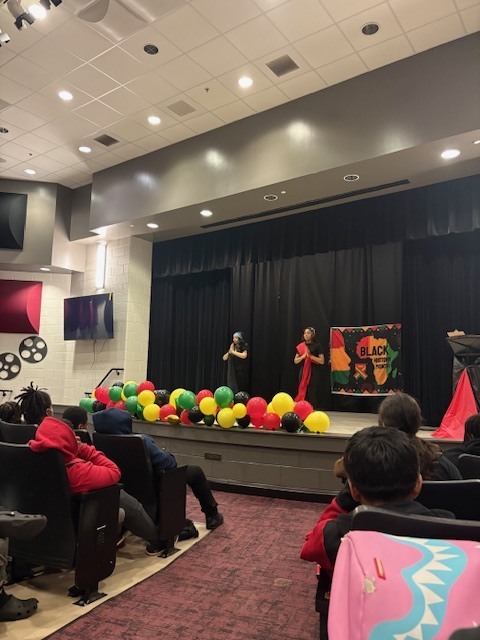 Two students preforming at the Black History Program at Williams Middle School.