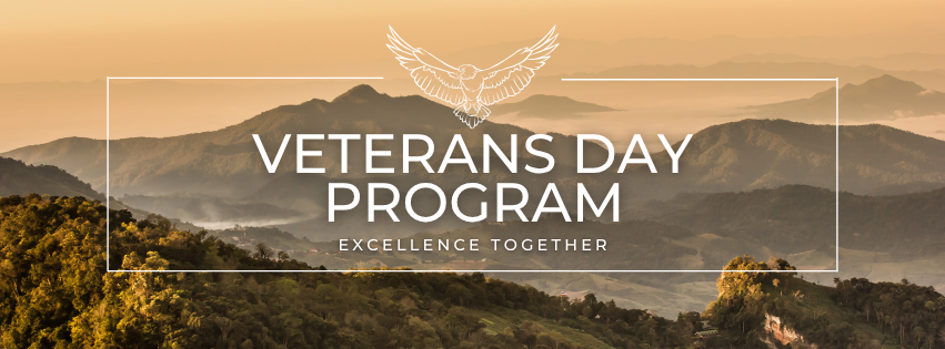 Beige and green mountains in the distance. There is a white rectangle with an eagle at the top enter and the words "Veterans Day Program" and "excellence together" in the center.