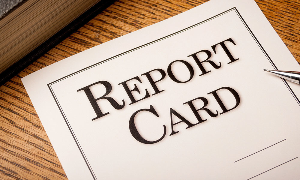 Large paper that says Report Card