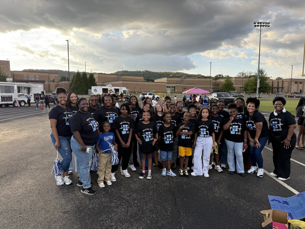 Newly elected student council members and advisors outside right be marching in the Jemison High School parade.