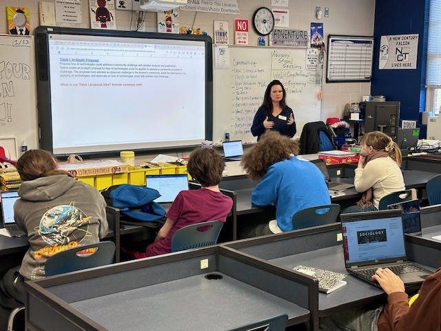 Students listen to an AI lecture.