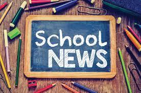 Chalkboard with School News surrounded by school supplies.