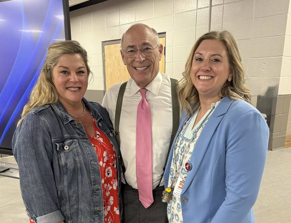 James Spann poses with Principal Lisa O'Bradovich and Assistant Principal Selena Hughes