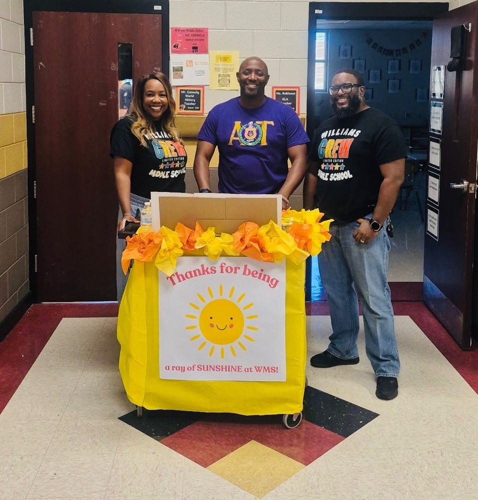 Williams Middle School administration team with the sunshine cart.