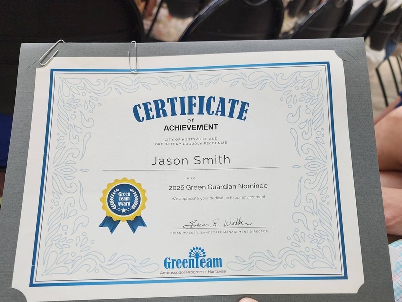 A certificate naming Jason Smith as the sponsor of our Green Team