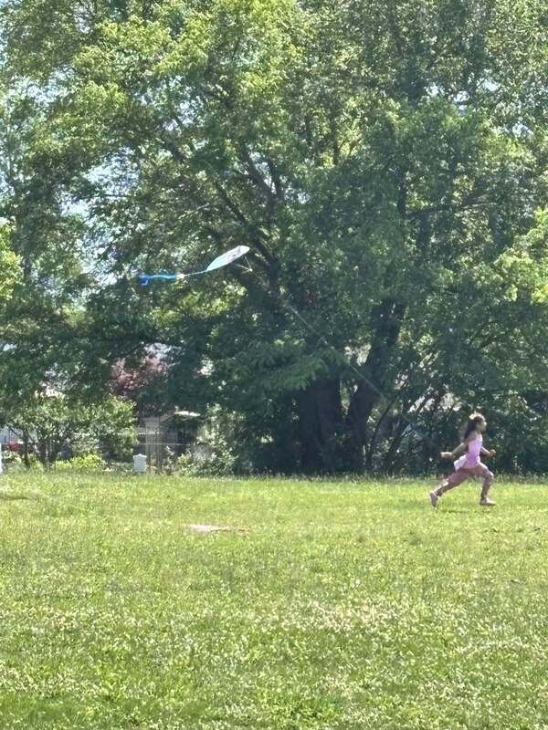 First grader flying a kite!