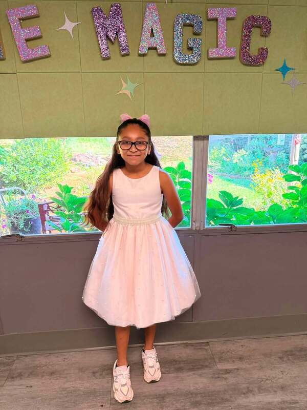A 3rd grader dressed for Fancy Friday
