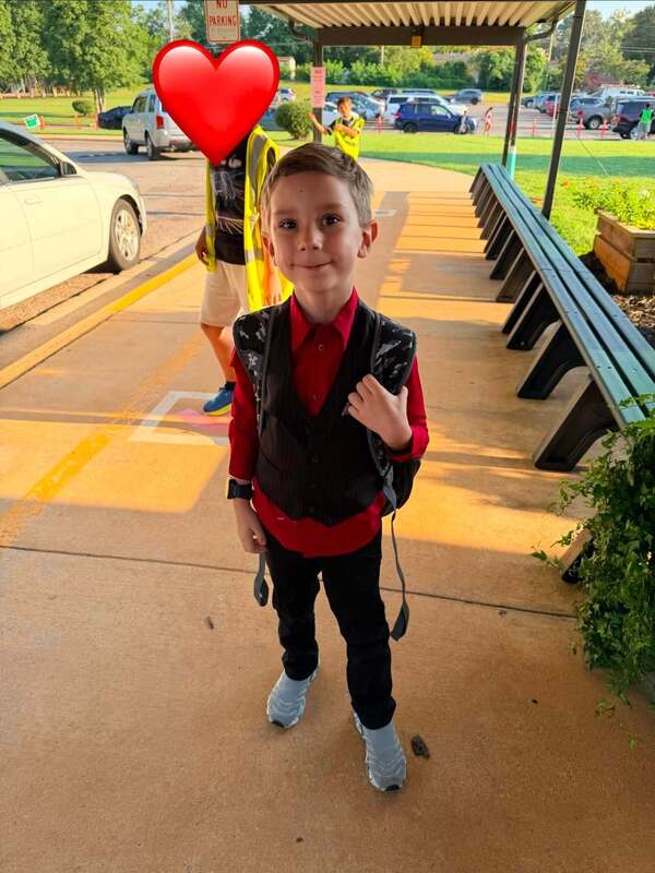 A first grader ready for Fancy Friday.