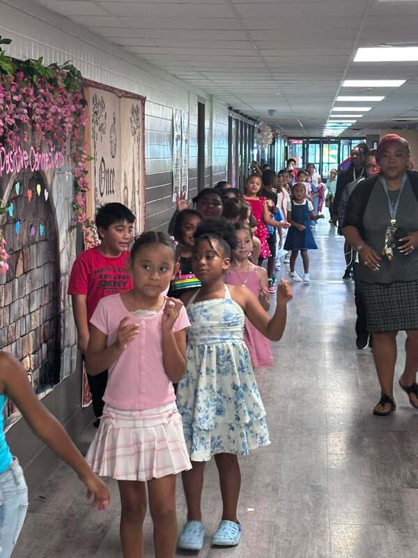 Students dancing during the School Stroll.