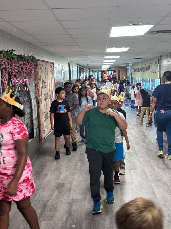 Third graders strolling through the school after the PBIS Kickoff.