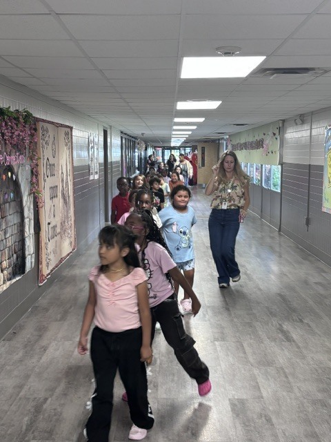 Mrs. Legg and her class having fun during the School Stroll.
