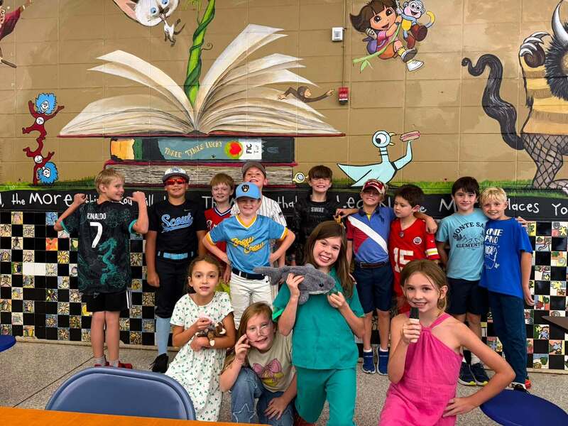 students standing dressed up in outfits as future careers such as princess, cheerleader, doctor