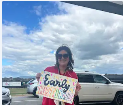 Ms. Byars with her early retirement sign as her job