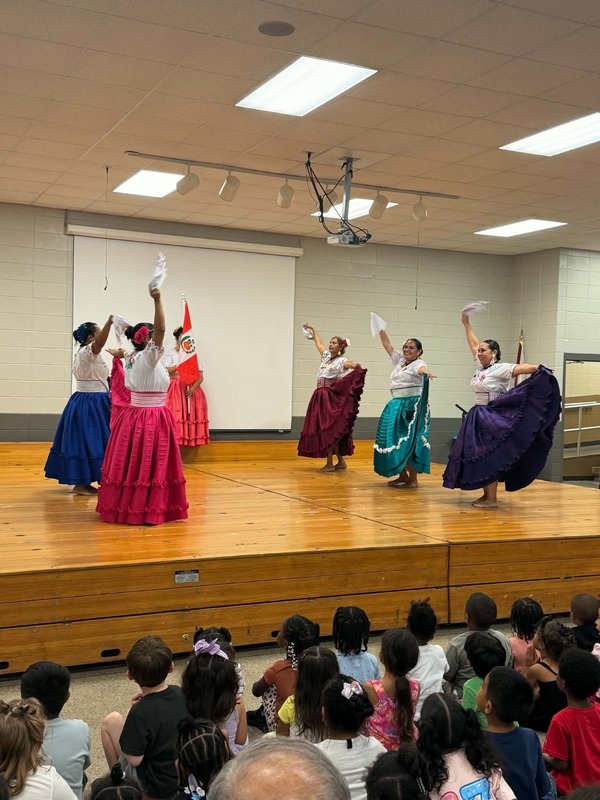 The Latin Roots dancers dancing to Marinera Nortena.