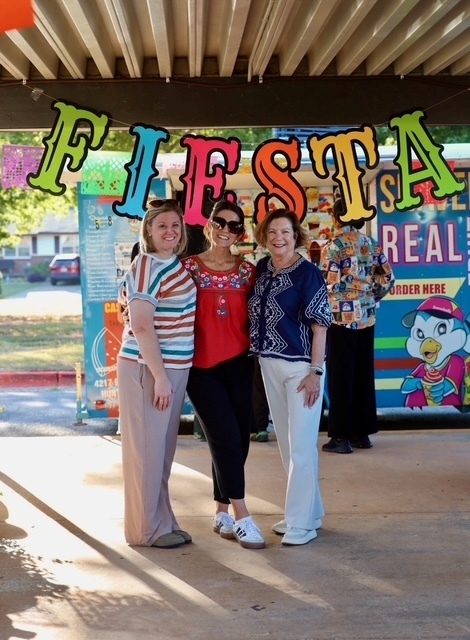 Principal Hughes, Assistant Principal Brandon, and Representative Marilyn Lands enjoying the festivities.