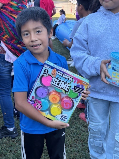 Loteria winner and his slime prize.