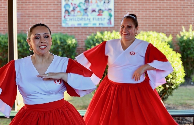 Latin Roots Folklore dancers performing.