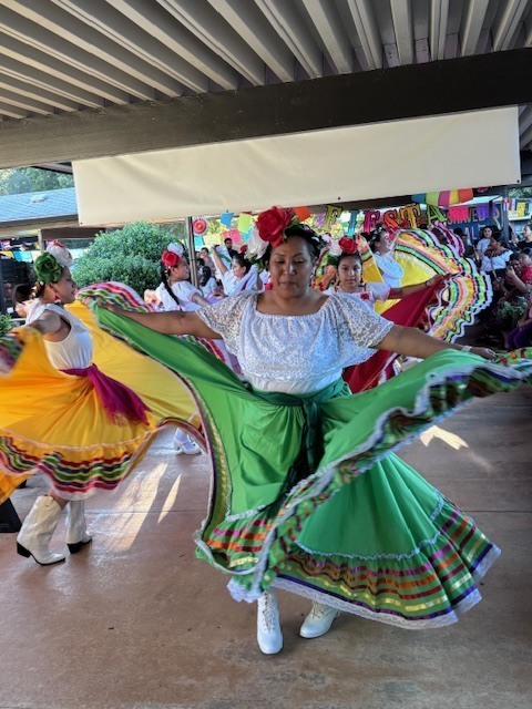 Latin Roots Folklore dancers performing.