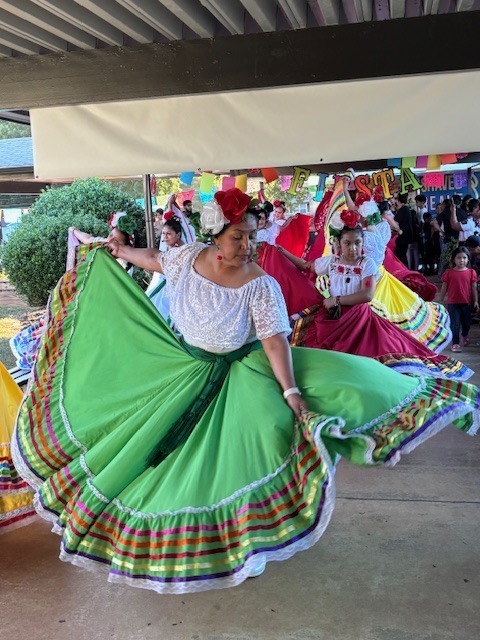 Latin Roots Folklore dancers at the event.
