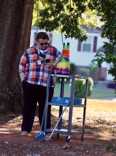 Mr. Whetstone is ready for students to come hit pinatas.