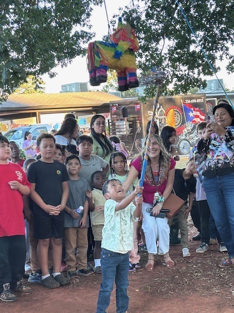 Student trying to break the pinata.
