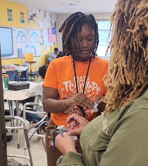 AP Stallworth-Brown collects Mrs. Elike's photos.