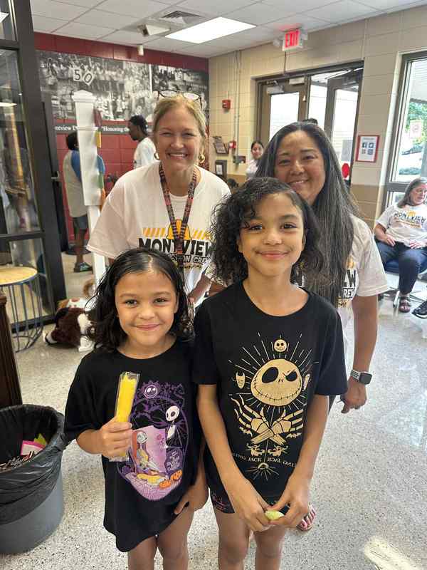 Photo of Mrs. Nurre, Mrs. Steiner and two students, Mary and Karrie.