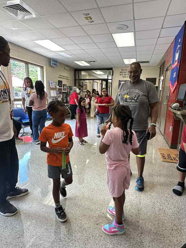 Students and families coming in to meet the staff.